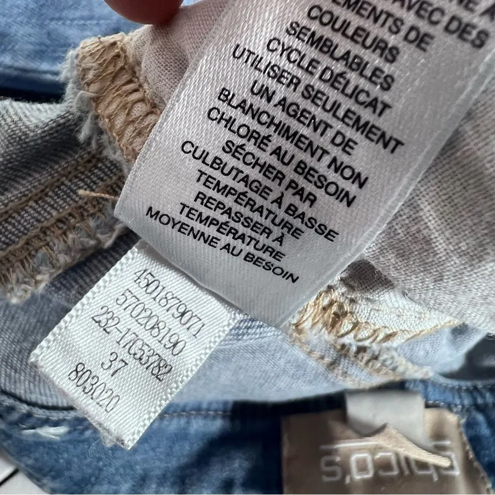 Chico's so slimming distressed ankle fit jeans.